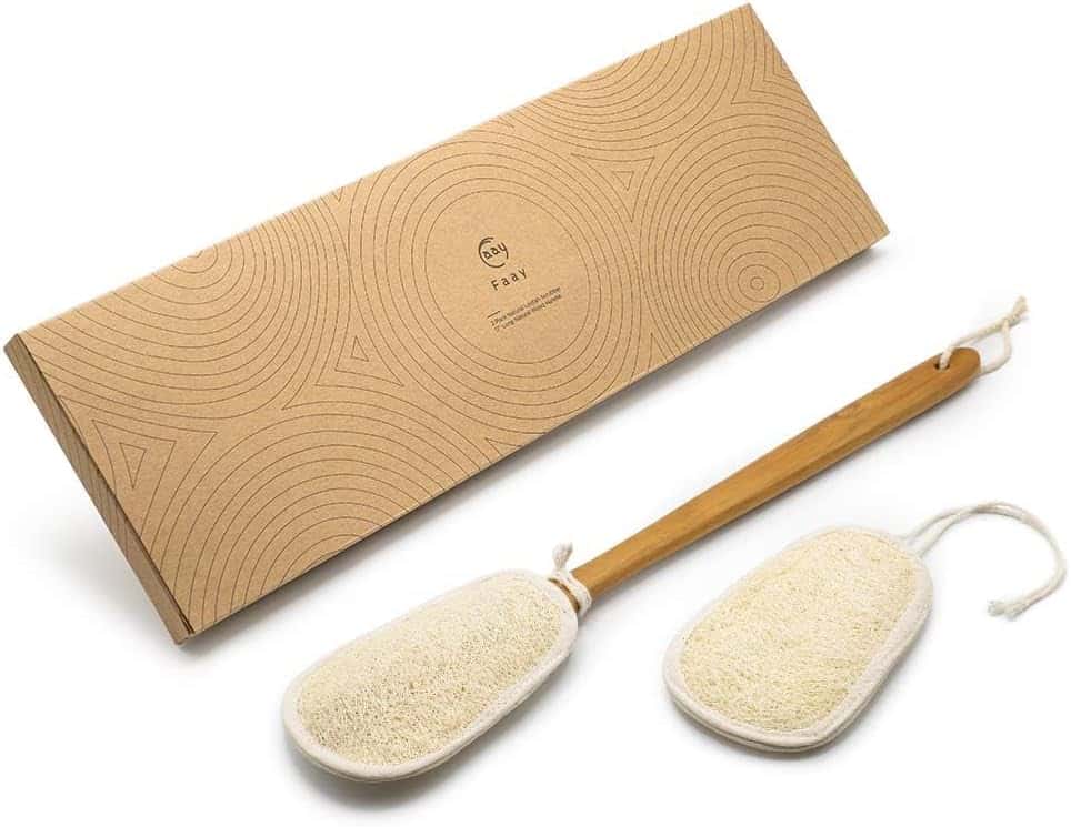 Sustainable shoe cleaning tools with wooden handle and pumice stones for eco-friendly footwear care.