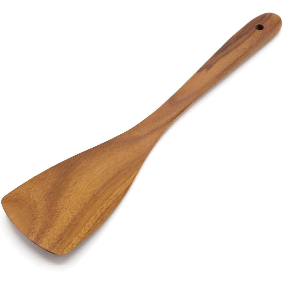 Eco-friendly wooden kitchen spoon for cooking and stirring. Adds natural charm to your kitchen utensils.